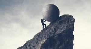 Sisyphus pushing boulder